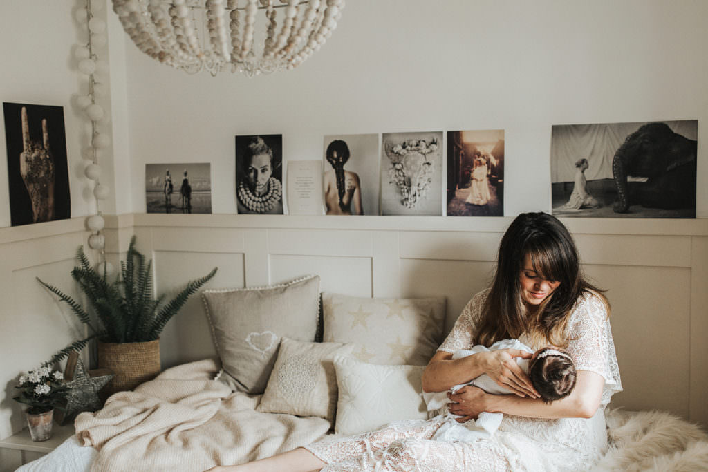 boho mother and newborn