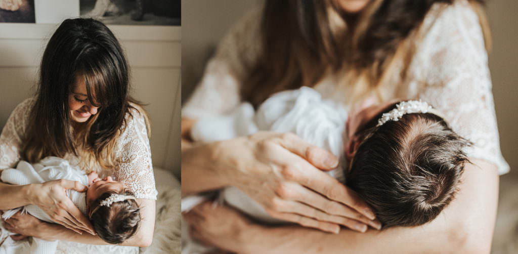 boho mother holding a newborn baby