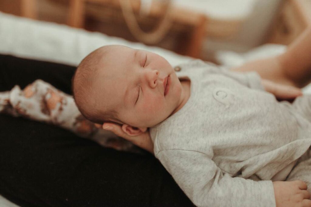 Close up of baby asleep in-home newborn photographer session