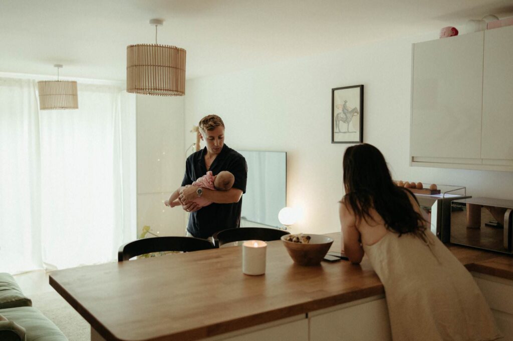Lifestyle baby photoshoot in Newquay capturing authentic family moments at home