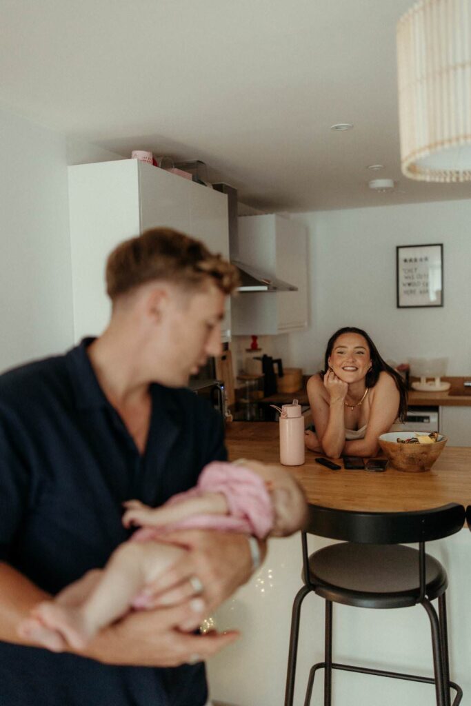 Lifestyle baby photoshoot in Newquay capturing authentic family moments at home